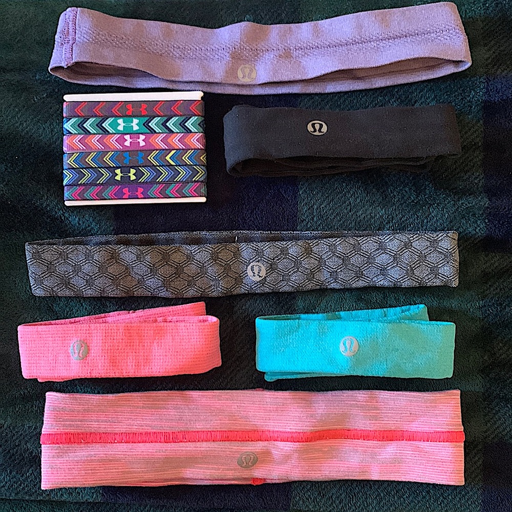 Assorted lululemon headbands and under armor elastics